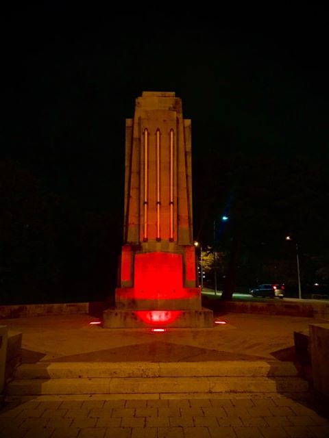 red lit cenotaph